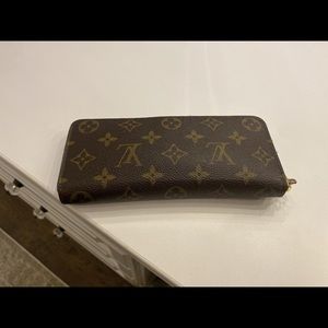 Louis Vuitton Clémence Wallet in monogram canvas with rose ballerine interior.